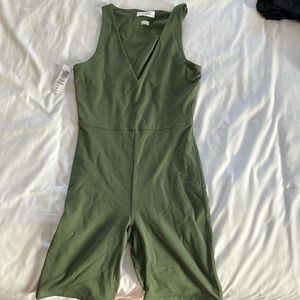 Unworn green body suit. Beautiful but I can’t fill it out properly!